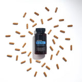 dōTERRA Deep Blue Polyphenol-Komplex 60 Kapseln verstreut weißer Hintergrund | Natürliche Pflege doTERRA