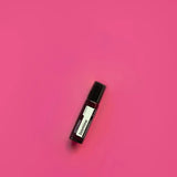 dōTERRA Jasmin Touch Roll-On 10ml – Flasche vor leuchtendem Fuchsia-Hintergrund, Vogelperspektive | doTERRA