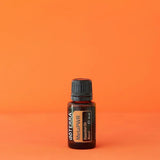 dōTERRA MetaPWR Mischung 15ml auf leuchtendem Orangehintergrund | doTERRA