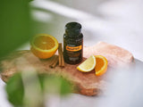 dōTERRA MetaPWR Mito2Max – Zitrus, Zimt und Orangenscheiben auf Holz | doTERRA