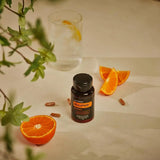 dōTERRA MetaPWR Mito2Max – Orangensegmente mit Wasser und Pflanze | doTERRA