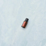 dōTERRA On Guard Mischung 15ml liegend auf hellem Marmor | doTERRA