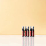 dōTERRA On Guard Schutzspray 27ml – Fünf Flaschen in Reihe auf beigem Hintergrund | doTERRA