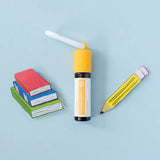 dōTERRA Thinker Roll-On 10ml mit Büchern und Stift vor blauem Hintergrund | doTERRA