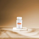 dōTERRA Zendocrine Komplex 60ct weiße Flasche auf Sockel vor beigem Hintergrund | doTERRA