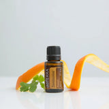 dōTERRA Zendocrine Mischung 15ml – Flasche mit Orangenspirale und Koriander auf weißem Hintergrund | doTERRA
